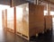 Stack of shipments boxes on wooden pallets. Interior of warehouse storage.