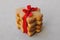 Stack of shortbread cookies in the shape of Christmas tree with beautiful red ribbon. Sweet gift