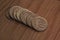 A stack of small copper coins of 10 cents