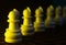 Stack of Soldiers Pawns Troop Lying on a Dark Surface Photograph