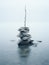 Stack of stones in shallow water on the seaside. Pebble cairn, landmark, stone stack in a calm misty ocean. Generative AI
