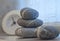 Stack of stripy pebbles on a windowsill