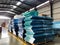 Stack of tack plastic sheets are kept in the warehouse. acrylic glass, building materials storage.