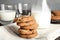 Stack of tasty chocolate chip cookies and milk