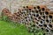 Stack of terracotta tube planters for gardening