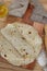 Stack of thin flatbread lavash on a wood serving board