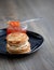 Stack of thin Russian pancakes with caviar for Shrovetide Butter week festival meal, pancakes day meal, Shrove Tuesday  Mardi