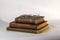 Stack of Three Antique books with a pair of vintage eyeglasses