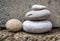 Stack of three balanced pebbles