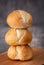 Stack of three small loaves of sourdough bread