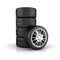 Stack of tires with alloy wheels