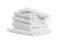 Stack of towels and bedding on white background