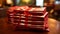 Stack of Traditional Lucky Red Envelopes on Wooden Table