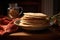 stack of uncooked tortillas on a plate