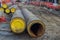 Stack of underground insulated pipes for heat system