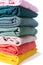 Stack warm colorful textiles cotton background