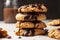 stack of warm and fluffy gluten-free vegan cookies, topped with melted chocolate