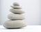 Stack of white balanced zen spa stones isolated. white background. 3d illustraton