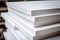 Stack of white extruded polystyrene sheets insulative material for buildings