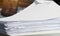 Stack white paper Document pile on office desk, Stack of business paper on table with blurred of meeting room background. Job busy