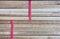 Stack of wood timber background tied with red plastic ready to sell