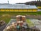 Stack of wooden pallets aerial view. Outdoor pallet storage area under the roof next to the chicken farm. Piles of Euro-type cargo