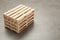 Stack of wooden pallets on light grey table, space for text