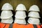 Stack of workers\' helmets