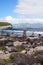 Stack of zen stones on beach.Cairns on the beautiful sea beach of Praia do Areal de Santa Barbara, island of San Miguel, Azores,