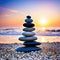 Stack of zen stones on pebble beach at