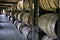 Stacked aging whiskey, scotch, bourbon barrels in Kentucky