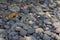 Stacked Beach stones and pebble texture for industrial background