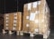 Stacked of cardboard boxes wrapped plastic film on pallet rack. Cargo shipment boxes. Warehouse storage. Manufacturing warehousing
