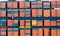 Stacked cargo containers in industrial port with containers. cargo shipping container box in logistic shipping yard with cargo