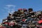 Stacked cars at a junkyard.