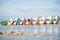 Stacked catamarans on the lake. Bright colorful pedal boats at the lake beach