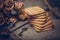 Stacked chip cookies on brown napkin. Symbolic image. Stack of biscuits concept for a tasty snack. Sweet dessert