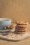 Stacked chip cookies with nuts and coffee cup/ stacked chip coo