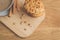 Stacked chip cookies with nuts and coffee cup/ stacked chip cookies with nuts and coffee cup on a wooden table. Top view and