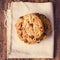 Stacked chocolate chip cookies on linen canvas. Country style. T