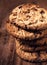 Stacked chocolate chip cookies on wooden background. Chocolate c