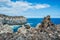 Stacked cliff volcanic rocks next to the turquoise sea in Alagoa da FajÃ£zinha, Terceira - Azores PORTUGAL