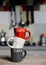 Stacked coffee cup and vintage coffeepot on kitchen stove