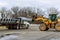 stacked concrete pipes and loaded flatbed trailer delivery