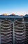 Stacked flat lounge crusie ship deck, morning, sunlight on mountains, Alaska.