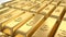 Stacked golden bars with bitcoin symbol, closeup
