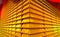 Stacked golden reflective and shiny gold bars or gold bullion