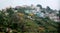 Stacked houses built and trees on the kodaikanal tour place.