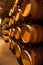 Stacked oak barrels of Cabernet