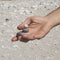 Stacked pebble stones in man`s hand